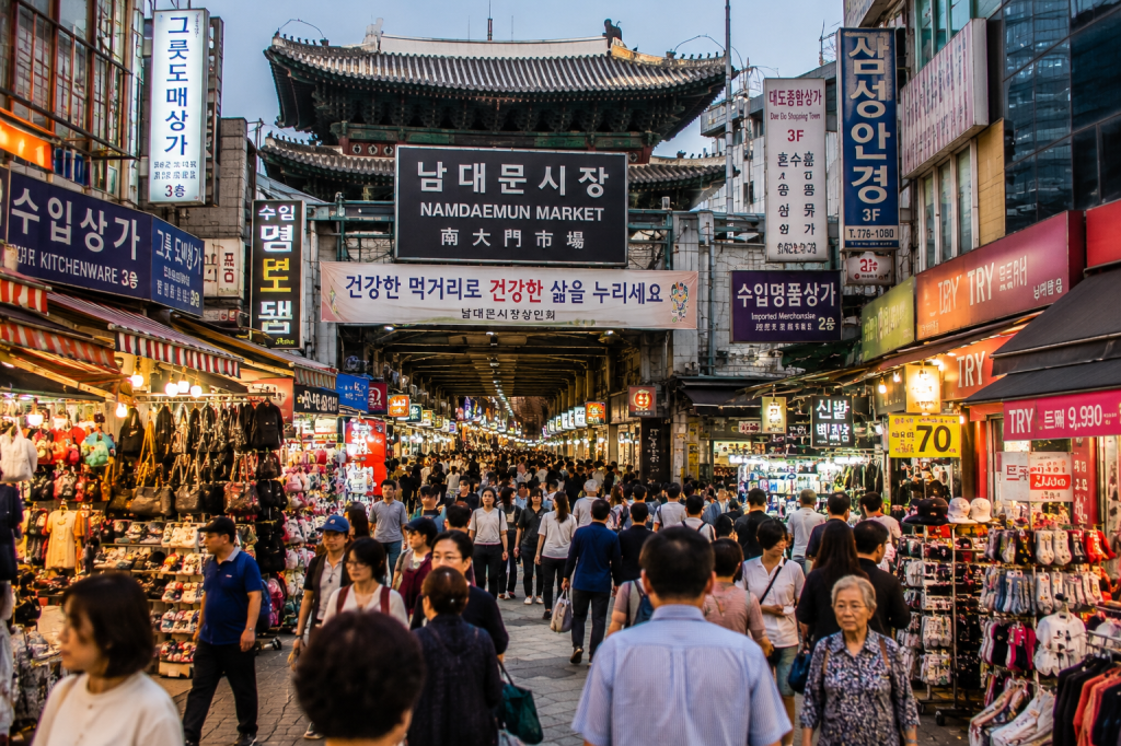 Busy Namdaemun Market street with shops and visitors in Seoul, South Korea