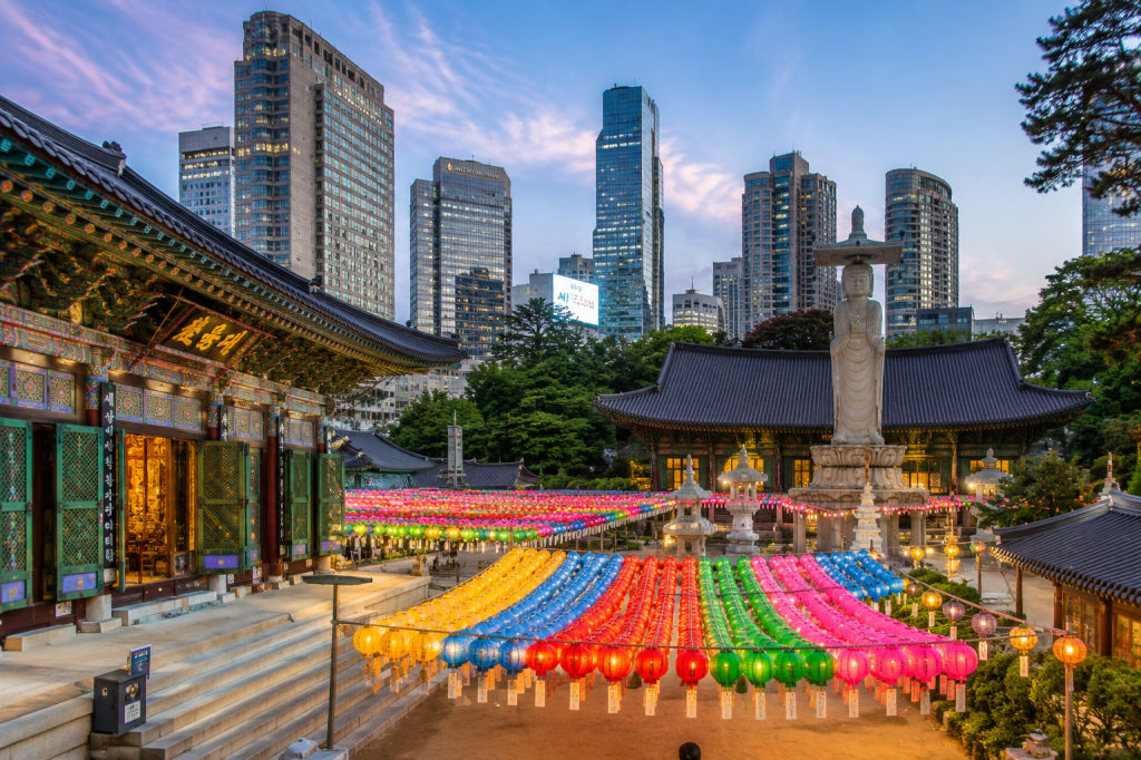 Bongeunsa Temple with traditional Korean architecture and modern skyscrapers in Seoul